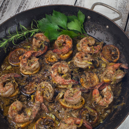 Jumbo shrimp bathed in a buttery bath of herbs and spices. The perfect appetizer skillet. (All photos credit: George Graham)