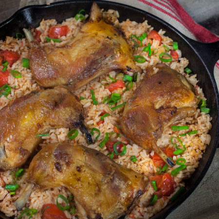 Crisp chicken thighs top rich tomato-infused Louisiana jasmine rice in this classic Creole dish. (All photos credit: George Graham)