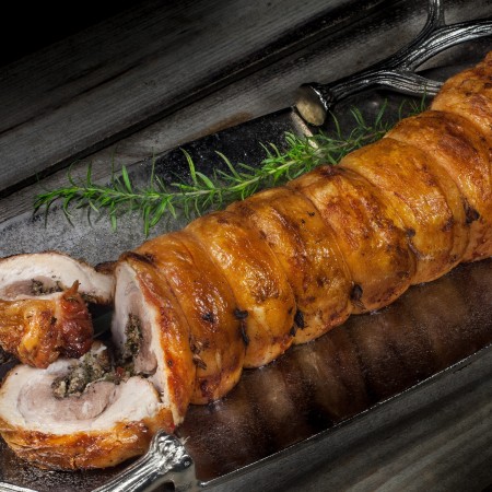 Stuffed, tied, and roasted, this pork belly transforms into a Cajun porchetta. (All photos credit: George Graham)