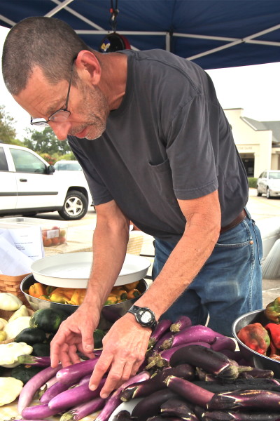 Charles Thompson at his farmers' market stall brings Cajun recipe ingredients to market.