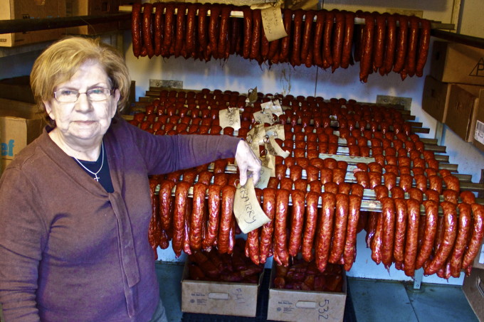 Nita LeJeune with her famous garlic sausage that adds smoke to many Cajun recipes like my Guinea Gumbo.