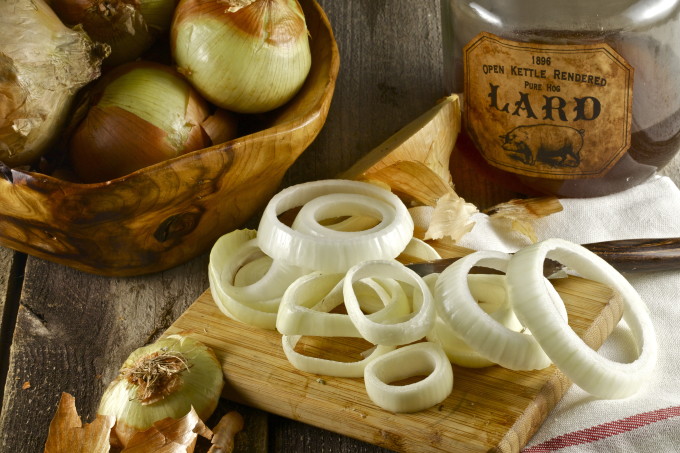 Cut your onions in varying sizes at a medium thickness, and fry in lard for a Cajun onion rings recipe twist.