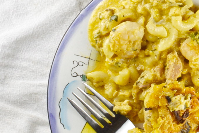 Seafood Mac and Cheese -- a tasty Cajun recipe. Oozing with creamy cheese goodness, this Seafood Mac and Cheese casserole ups the ante.