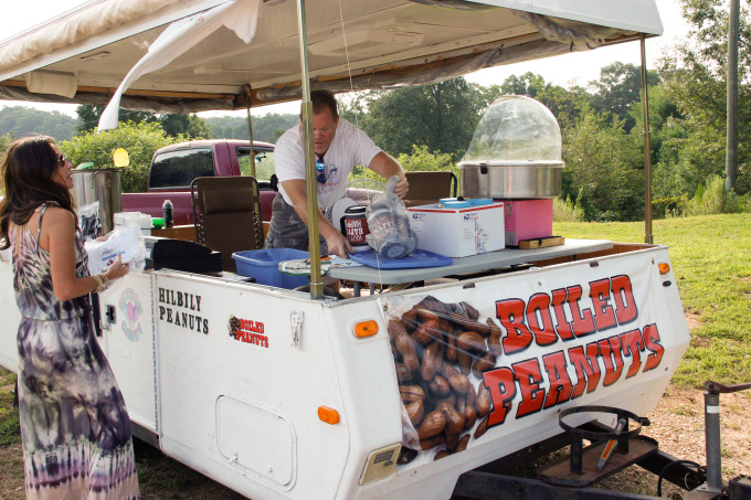 on the roadside, Cajun Boiled Peanuts--a spicy Cajun recipe. Rox and the "hilbily" peanut man in Buford, Georgia.