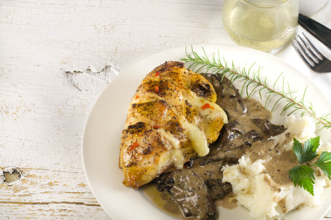 Stuffed Chicken with Mushroom Madeira featuring melted cheese is sure to become one of the classic Cajun recipes commonly seen in Cajun cooking. Stuffed Chicken with Mushroom Madeira is a delicious Cajun recipe.