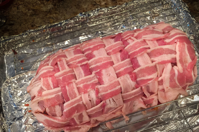 Bacon-Wrapped Meat Loaf preparation Wrapped up in smoky flavor, this is a dramatic Cajun recipe for Bacon-Wrapped Meat Loaf.