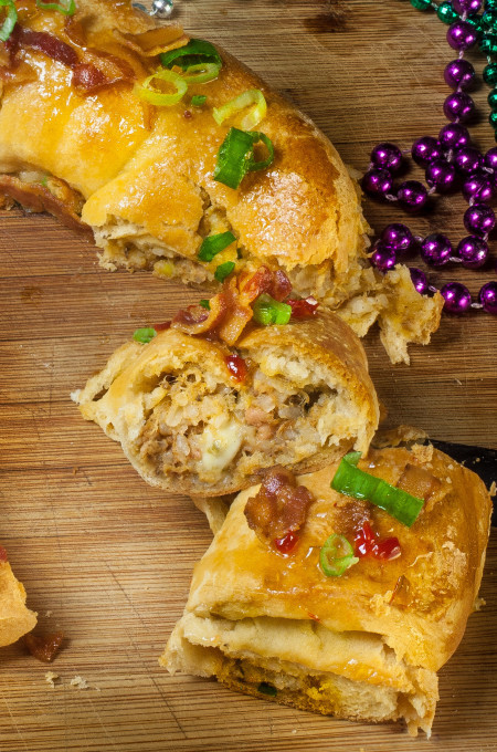 Melted cheese and spicy boudin royally redefines the Mardi Gras king cake in this easy Cajun recipe for Boudin King Cake.