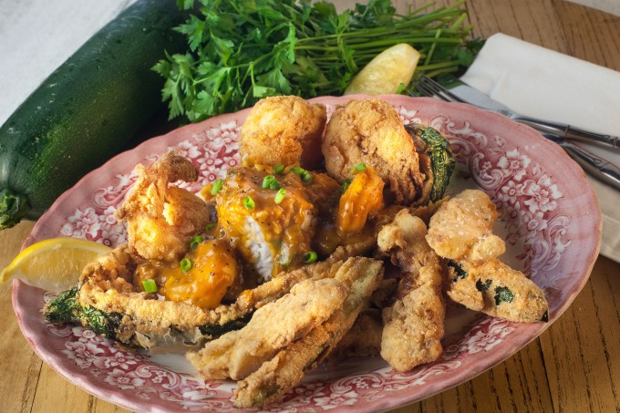 Shrimp and Zucchini Pirogue Shrimp and Zucchini Pirogue: Hollowed out, fried zucchini with a mound of shrimp étouffée topped with fried jumbo shrimp--a classic Cajun recipe combination. (All photos credit: George Graham)