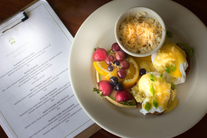 Poached Eggs over Fried Green Tomatoes with menu A brunch menu full of South Louisiana favorite Cajun recipes including Poached Eggs over Fried Green Tomatoes.
