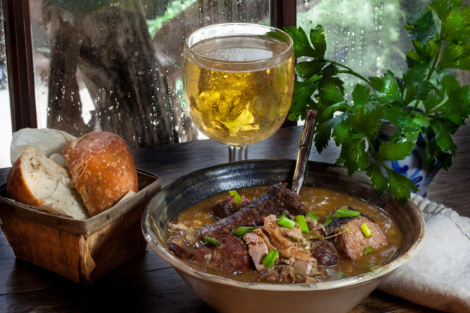 Pork Neck Bone Fricassée Succulent morsels of pork clinging tenderly to the bone swim in a bowl of dark roux-based gravy in this Cajun recipe for Pork Neck Bone Fricassée. (All photos credit: George Graham)
