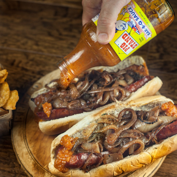 Pig Stand is my barbecue sauce of choice for the balance of flavors in this Cajun recipe for Smoked Sausage Po'Boy .