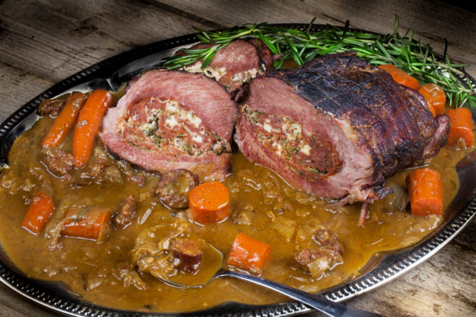 Oven-roasted pork in a rich onion gravy is a Cajun specialty. (All photos credit: George Graham)