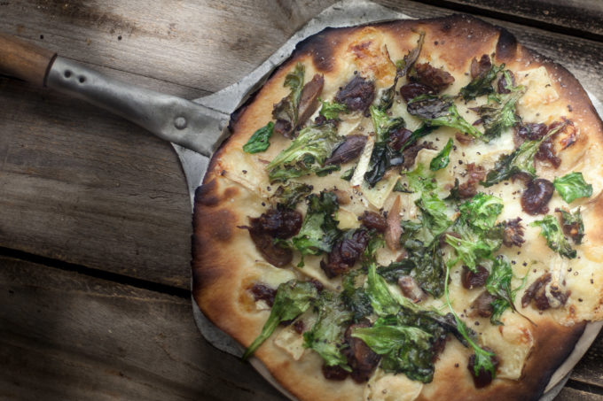 Duck and Brie Pizza Duck combines with creamy brie cheese in this one-of-a-kind Cajun recipe for pizza. (Photo credit: George Graham)
