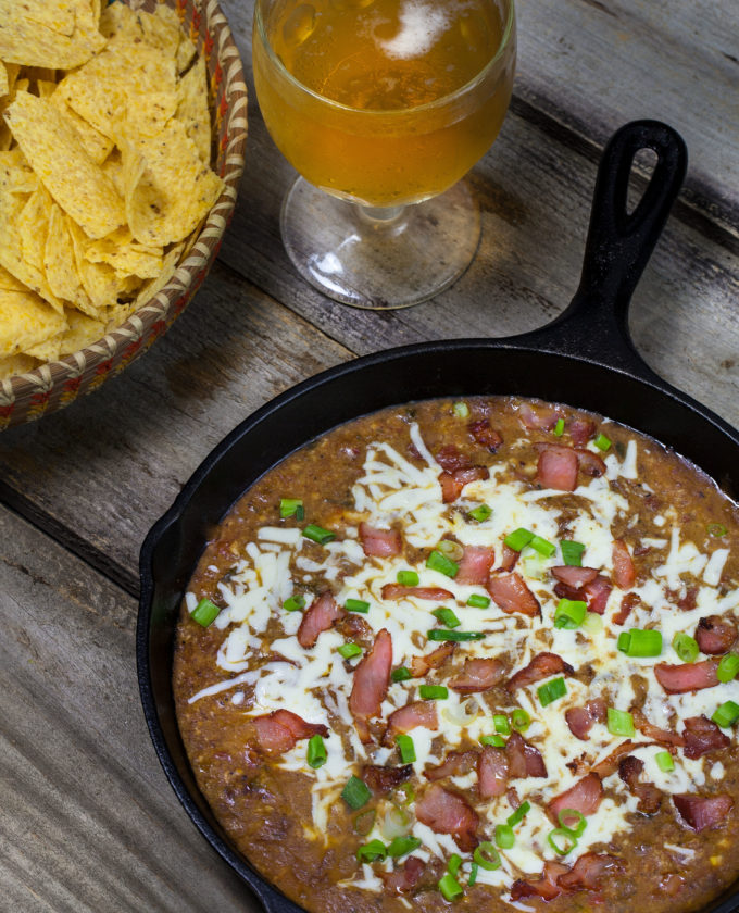Tasso Chili Cheese Dip with beer Oozing with cheese and the smoky taste of Cajun spiced tasso, this Tasso Chili Cheese Dip is the perfect party food and an easy Cajun recipe.