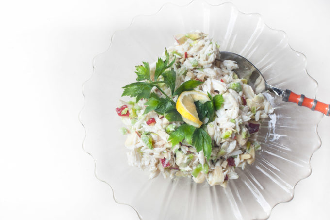 Lumps of white crabmeat fresh from Gulf waters are treated lightly in this classic salad combination. (Photo credit: George Graham)