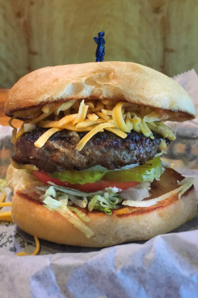 The vertically stacked Little Boy Burger is anything but little. This Cajun recipe is Cajun cooking at its best!