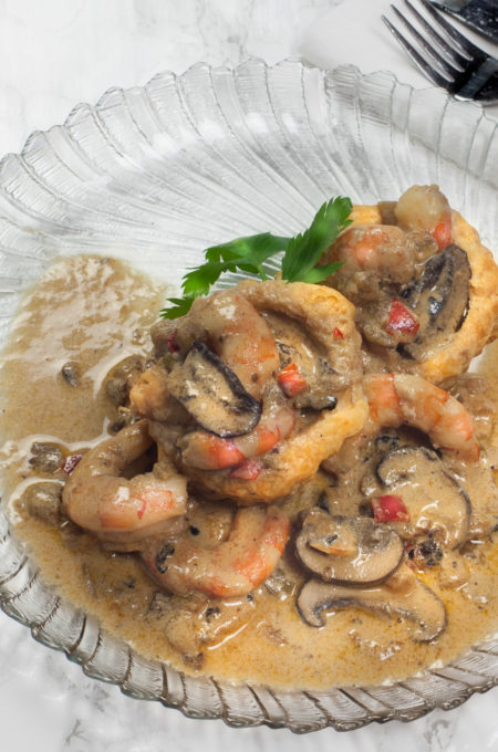 Shrimp and Mushroom Cream over Puff Pastry Shell plate Easy and elegant, Shrimp and Mushroom Cream over Puff Pastry Shell is a Cajun recipe combination that is sure to impress.