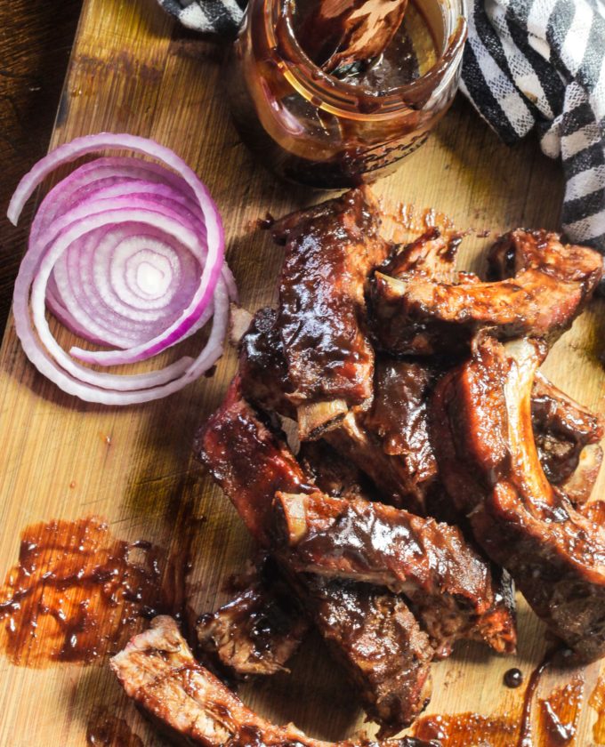 Smoked over peach wood and brined in bourbon, these Baby Back Ribs are infused with flavor.