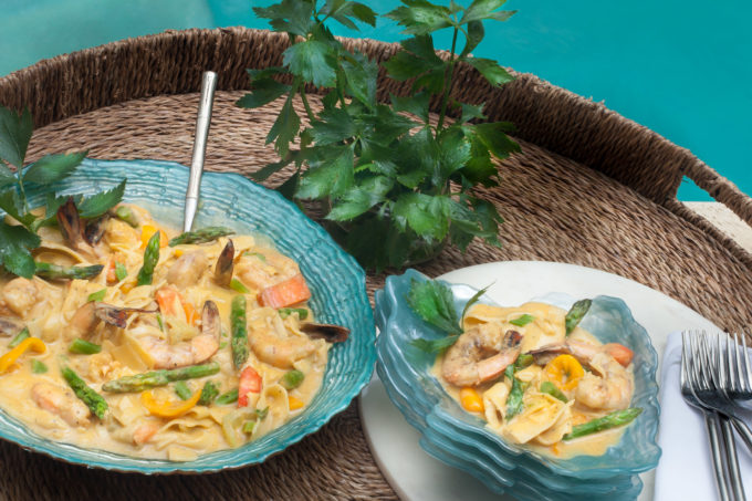 Jumbo Gulf shrimp swim in a creamy butternut sauce in this easy Butternut And Shrimp Pasta recipe.
