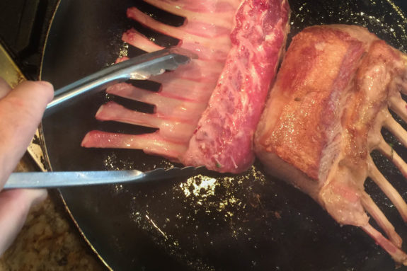 Browning the racks before roasting adds flavor.