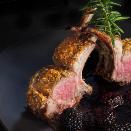 With its perfect pink center and cracklin' crust, lamb chops stand in a pool of blackberry wine-infused sauce. (All photos credit: George Graham)