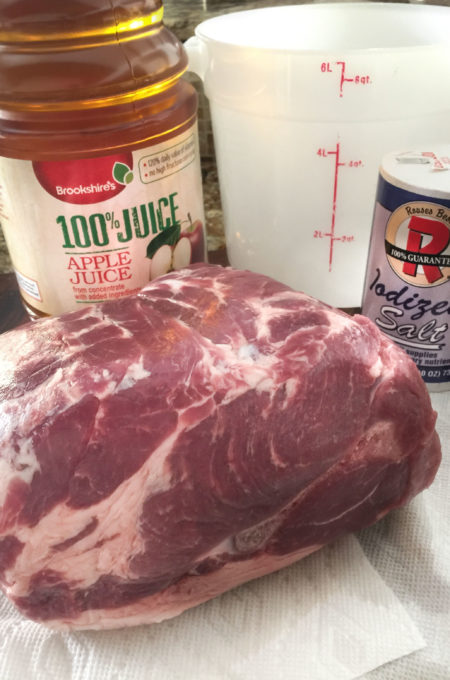 An overnight brine in apple juice and salt brings flavor to this roast.
