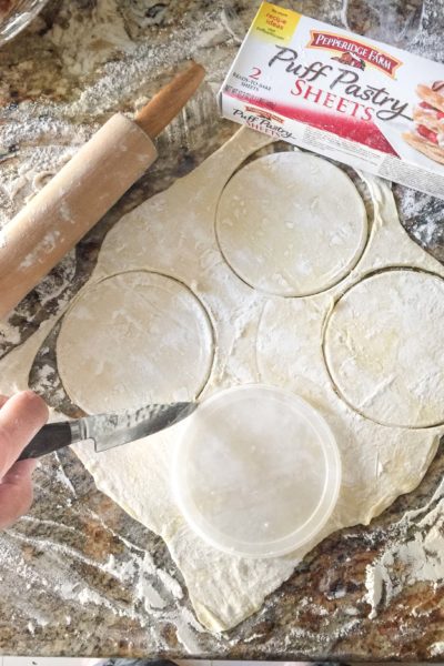Find a circular plastic lid or a saucer to use as a guide to cut out the pastry for your Crawfish Hand Pies.