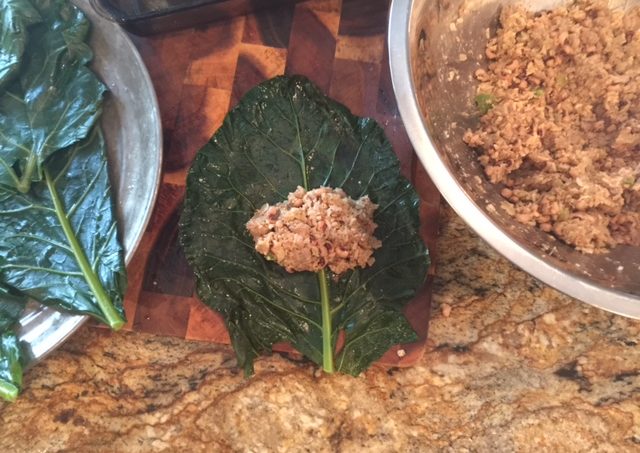 The large collard leaves hold plenty of stuffing in these Stuffed Collard Rolls.