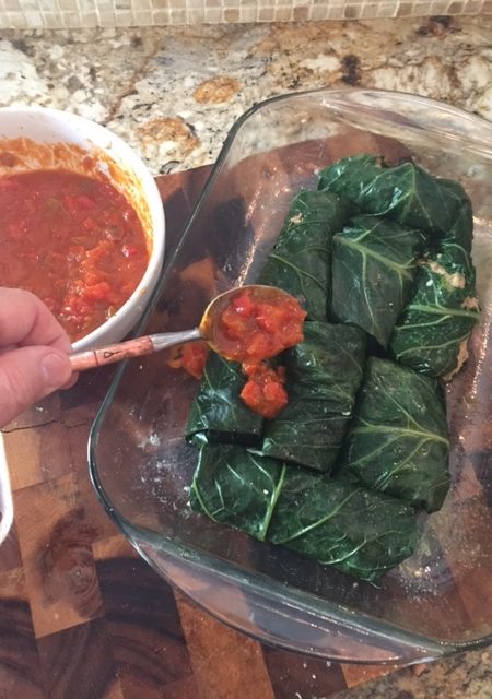 The tomato-based gravy adds a depth of flavor that works deliciously with these Stuffed Collard Rolls.