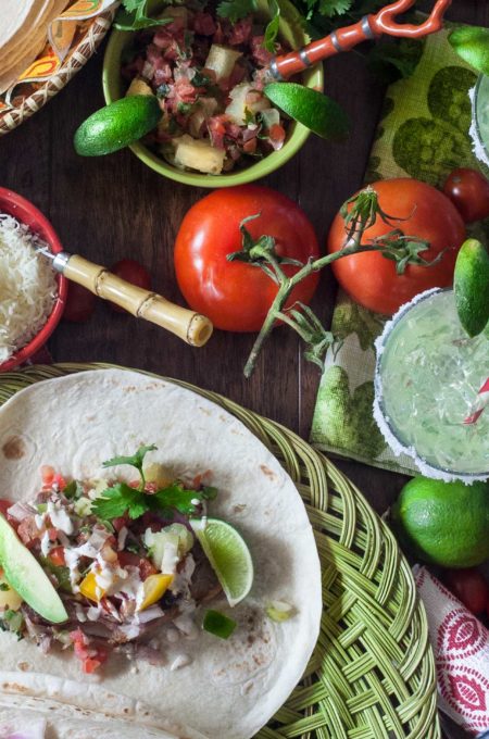 Cool and spicy, these Pulled Pork Tacos have a contrast in taste and texture.