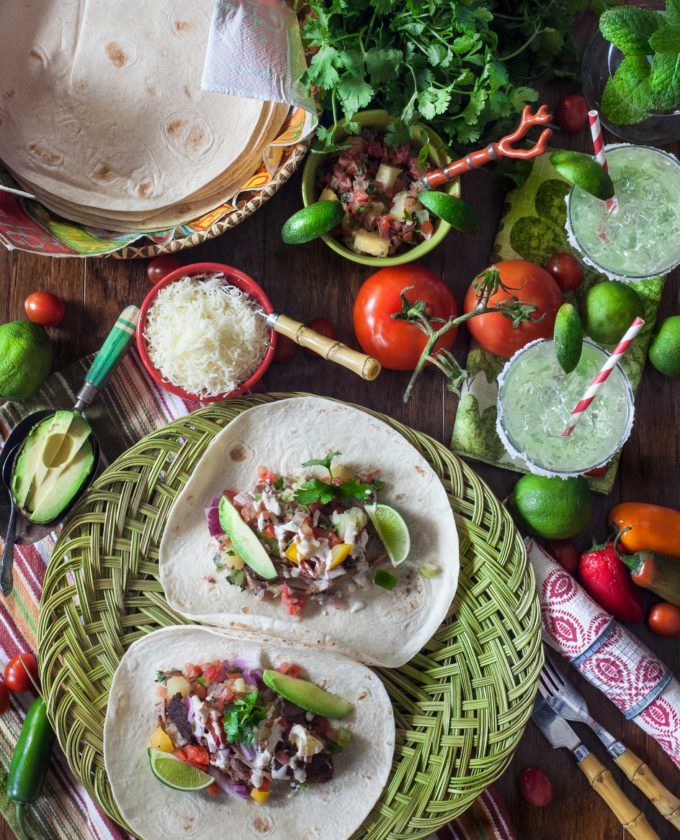 Don't forget the margaritas--the perfect accompaniment for these Pulled Pork Tacos.