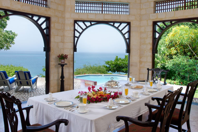 Overlooking the Caribbean, the dining room view is dramatic. (Photo credit: Internet archive)