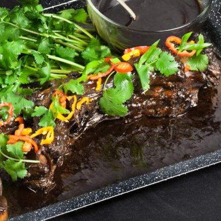 Dark and mysterious, this recipe for Braised Oxtail with Fig Habanero Pepper Jelly will be your new favorite. (All photos credit: George Graham)