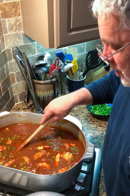Stirring the pot, Lee Robicheaux is a seasoned Cajun cook.