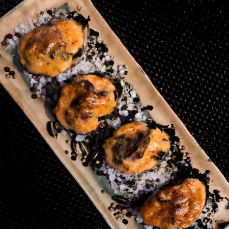 Baked Oysters with Collards and Cajun Hollandaise