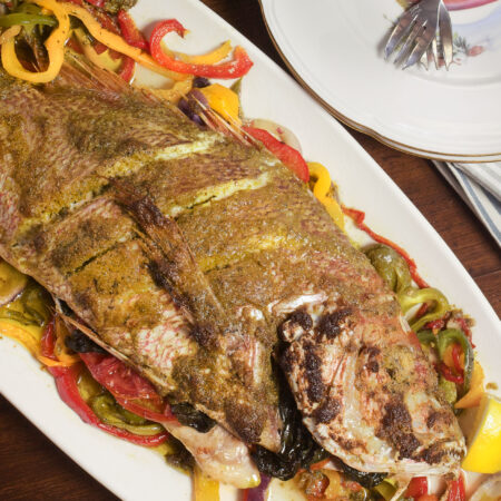 Whole Red Snapper stuffed with flavor is a dramatic plate presentation. (Photo credit: George Graham)
