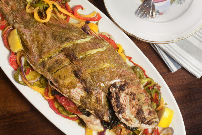 Whole Red Snapper stuffed with flavor is a dramatic plate presentation. (Photo credit: George Graham)