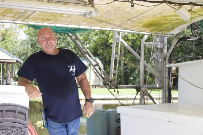 Captain Quincy on his boat on Bayou Dularge in Theriot, LA. (Photo credit: George Graham)