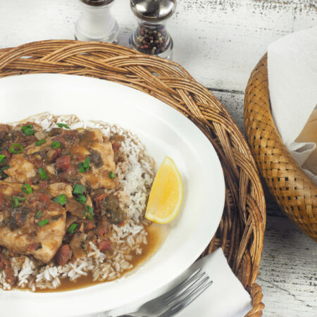 The spicy sauce infuses this Gulf fish with flavor. (Photo credit: George Graham)