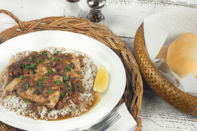 The spicy sauce infuses this Gulf fish with flavor. (Photo credit: George Graham)